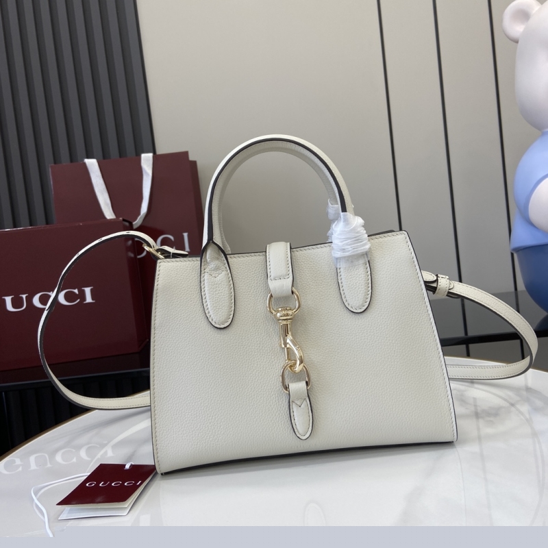 G*u*i top handle bags